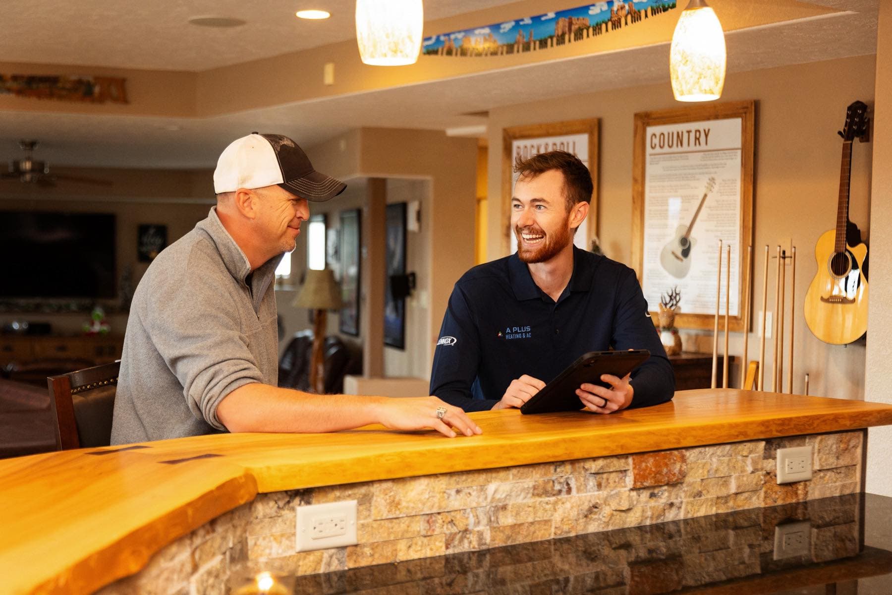 Technician reviewing system details with a homeowner